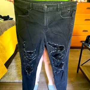 Black ripped high-waisted jeans